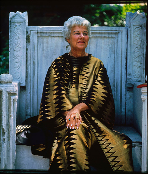 Peggy Guggenheim sitting on the throne in the garden of Palazzo Venier dei Leoni, Venice, 1960s